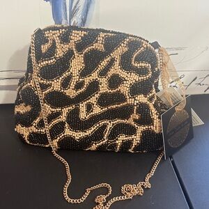 From India to you cheetah beaded clutch and gold crossbody chain bag